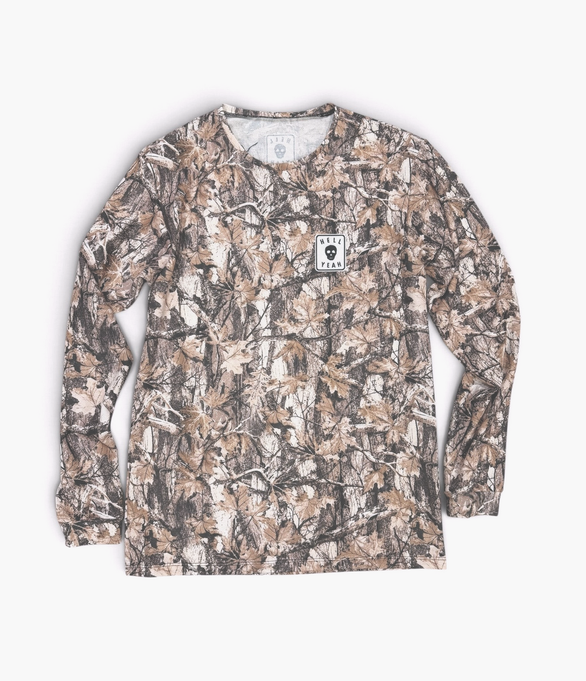LTP THRM.01 thermal long sleeve running shirt in forest camo print with moisture-wicking fabric and chest patch